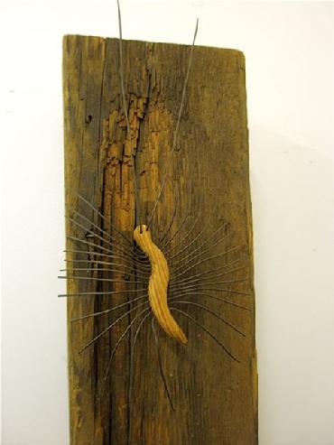 Hardware and natural elements mixed media wood and metal